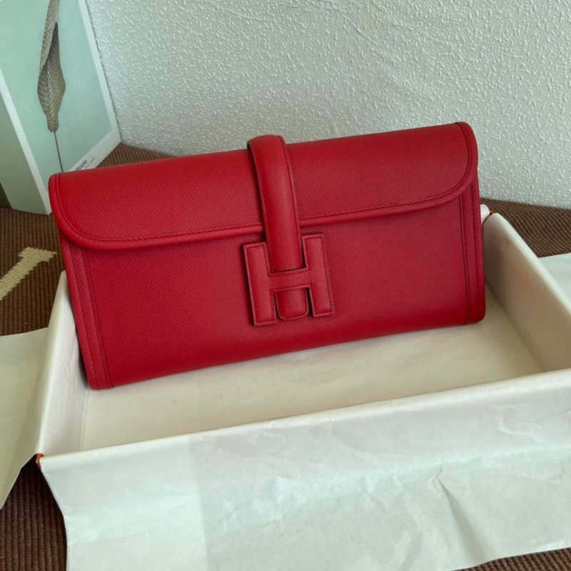 H**mes clutch bags